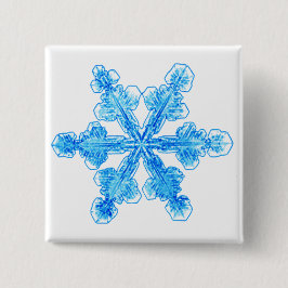 Blaue Winterschneeflocke Button