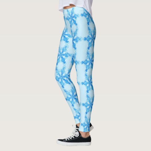 Blaue Winterschneeflocke Leggings (Links)