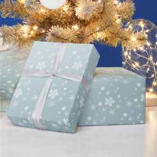 Blaue Winterwildblumen und Sterne Geschenkpapier