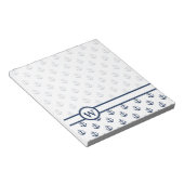 Blauer Anker der Nautischen Marine auf weißem Hint Notizblock (angewinkelt)