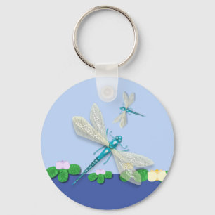 Blauer Damselflies über Water Lily's Schlüsselanhänger