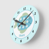 Blauer Fisch unter der Uhr der Mauer (Winkel)