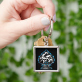 Blauer Flammenzug mit Skullen Schlüsselanhänger (Hand)