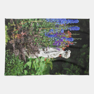 Blauer Garten und Statue des Delphinium Geschirrtuch