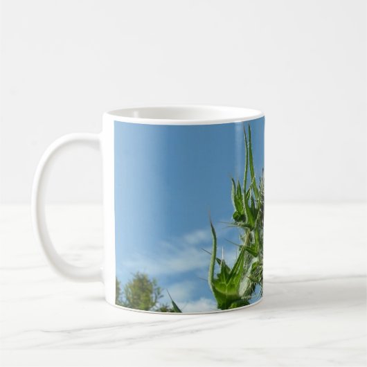 Blauer Himmel-schottische Distel-Kaffee-Tasse Kaffeetasse (Links)