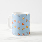 Blauer Hintergrund mit Blumen in gemischten Farben Kaffeetasse (Vorderseite Links)