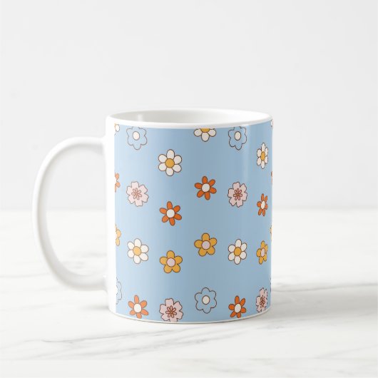 Blauer Hintergrund mit Blumen in gemischten Farben Kaffeetasse (Links)