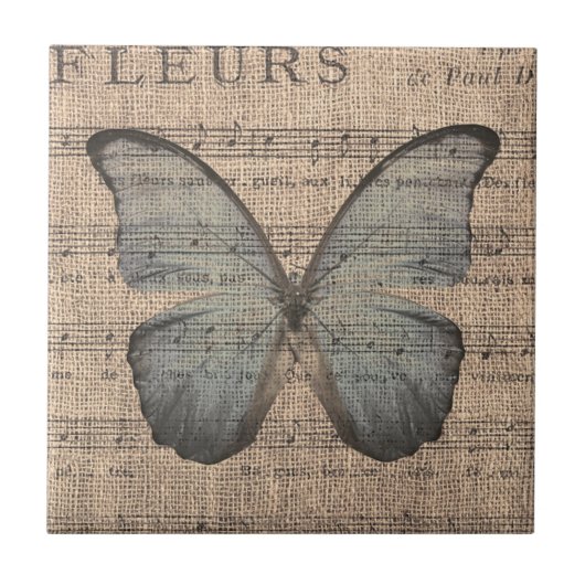 Blauer Schmetterling auf Vintager Blatt-Musik Fliese (Vorderseite)