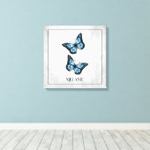 Blauer Schmetterling Blumenkanvas Print Leinwanddruck (Insitu (Holzboden))