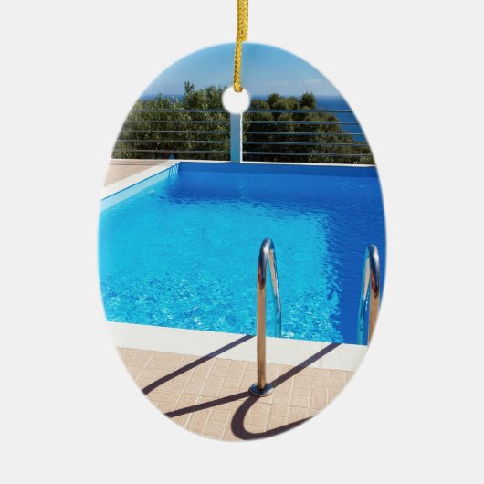 Blauer Swimmingpool mit Schritten in Meer Keramikornament (Vorne)
