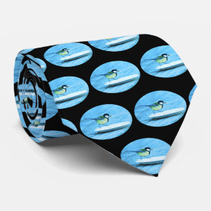 Blauer Tit Bird Fütternd von einem Kuchenschwarzen Krawatte