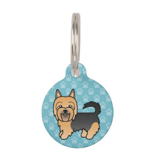 Blauer und brauner australischer Terrierhund auf B Tiermarke