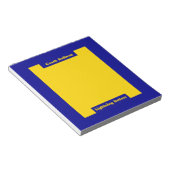 Blauer und goldener Trainer Notizblock (angewinkelt)