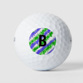 Blauer und grüner Spritzer erschüttert Golfball (Vorderseite)