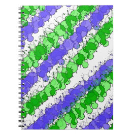 Blauer und grüner Spritzer erschüttert Notizblock