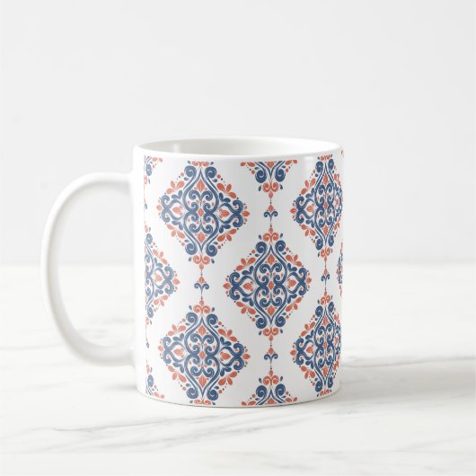 Blauer und orangefarbener, nahtloser Schnitt. Vint Kaffeetasse (Links)