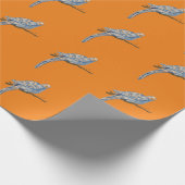 Blauer Vogel in Orange Geschenkpapier (Ecke)
