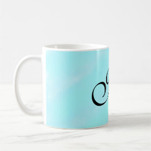 Blaues Aquarellfarben-Monogramm mit Buchstaben in Kaffeetasse