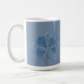 Blaues Blumenmuster auf verblasstem blauen Denim Kaffeetasse (Links)