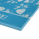 Blaues Blütenherz mit Blume Schneidebrett (Ecke)