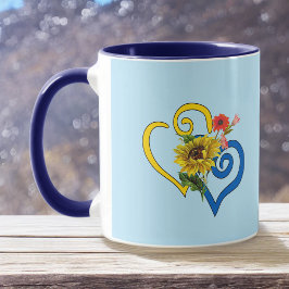 Blaues Gelbes geflecktes Herz mit Sonnenblume auf  Tasse