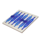 Blaues Glas Korkierte Flaschen Fliese (Seite)