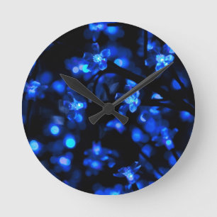 Blaues Licht - Hintergrund Runde Wanduhr