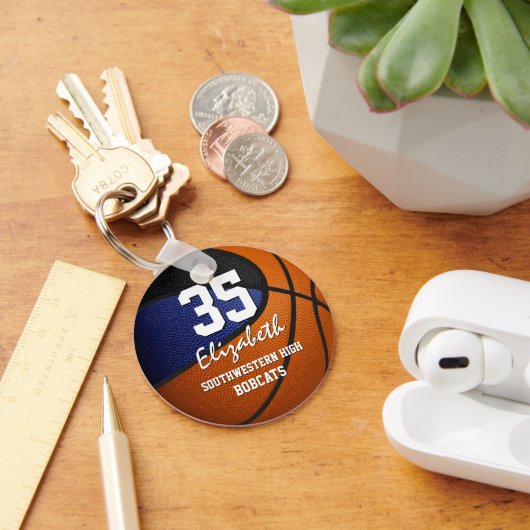 Blaues schwarzes Kindersportteam gibt Basketball Schlüsselanhänger (Schreibtisch)