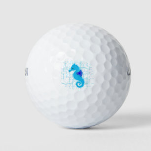 Blaues Seepferdchen auf einem abgenutzten Hintergr Golfball