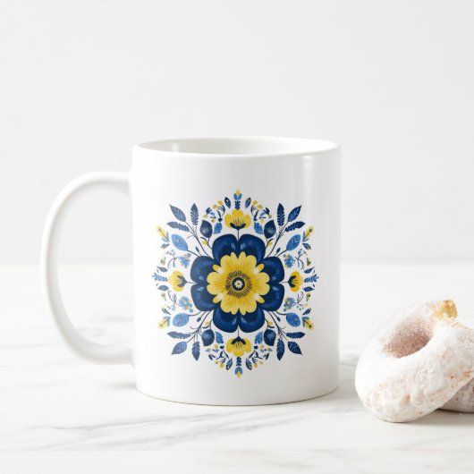 Blaues und gelbes Blumenmuster Kaffeetasse (Mit Donut)