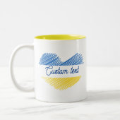 Blaues und gelbes Herz. Eigener Text. Personalisie Zweifarbige Tasse (Links)