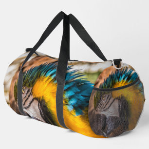 Blaues und gelbes Makaportrait Duffle Bag