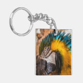 Blaues und gelbes Makaportrait Schlüsselanhänger (Vorderseite links)