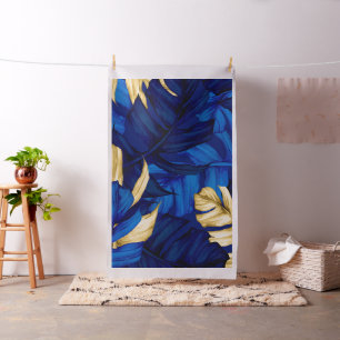 Blaues und goldenes tropisches Waldmuster Stoff