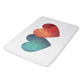 Blaues und rotes Herzpaar, modernes Design Badematte (Schrägansicht)