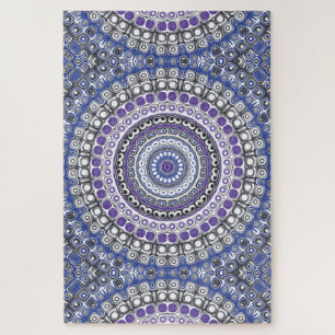 Blaues und violettes mandalaartiges geometrisches puzzle