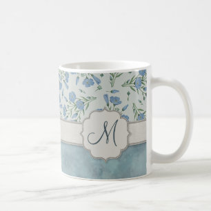 Blaues Vergissmeinnicht mit Blumen und Marmor mit Kaffeetasse