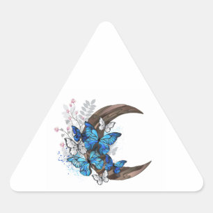 Blauschmetterlinge auf Holzhalbzeugen Dreieckiger Aufkleber