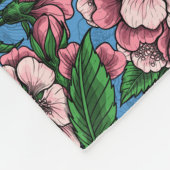 Blauzungenvögel im blühenden Kirschbaum auf blau Fleecedecke (Ecke)