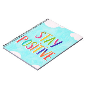 Bleib positiv Motivationszitat gemalt Notizblock