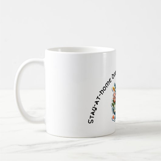 Bleibe-at-Zuhause gemein noch nicht stehend Kaffeetasse (Links)