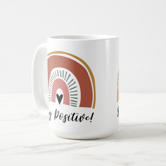 Bleibe Positiv! Niedlicher Boho-Regenbogen Kaffeetasse (Vorderseite Links)