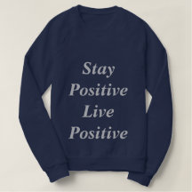 Bleibe Sie die Strickjacke der positiven positiven