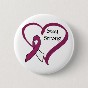 Bleibe Sie starken Burgunder und weißes Button