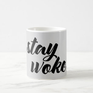 Bleibe Sie weckte Kaffeetasse