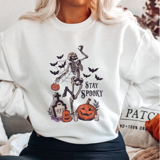 Bleibe Spooky Skeleton und Pumpkin Sweatshirt