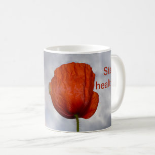 Bleiben Sie gesund mit roter Blume Kaffeetasse