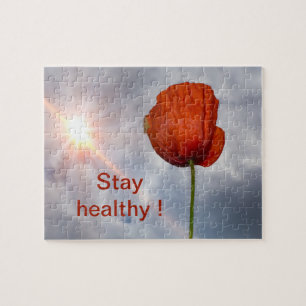 Bleiben Sie gesund mit roter Blume Puzzle