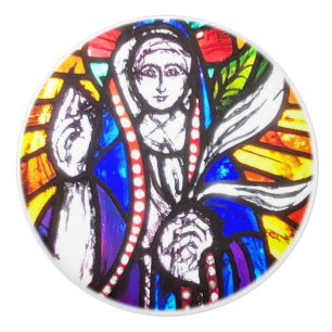 Bleiglasdesign mit religiöser Figur. Keramikknauf