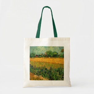 Blick auf Arles mit Schwertlilien von Vincent van Tragetasche